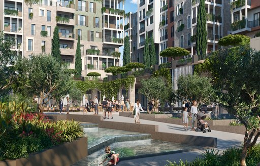 Overview of Boka Place water feature in courtyard, surrounded by blocks of apartments and trees