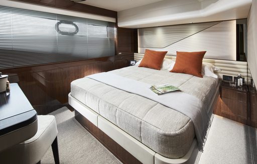 A guest cabin on board a Princess V78 luxury yacht for sale