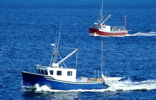 two fishing boats underway