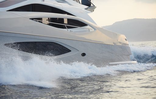 A side view of the aft section of superyacht ADONIS