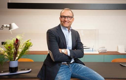 Landscape image of Antonini Navi sales manager Aldo Manna, with office desk and pot plant in background