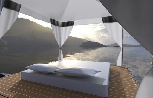 A bed on a retractable balcony on board a Zeelander Z72 yacht