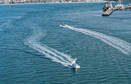 two boats passing port to port keeping clear