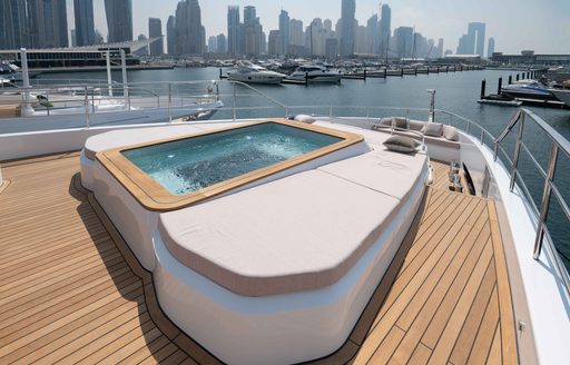 On-deck Jacuzzi onboard the Majesty 111, located on the bow with views over Dubai Harbour.