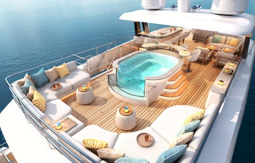 Overview of the aft deck onboard motor yacht MOONSHINE with a glass-fronted Jacuzzi and white seating