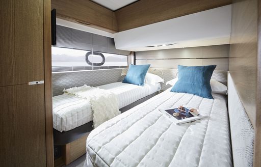 twin berth guest cabin on the Princess V65 sports yacht