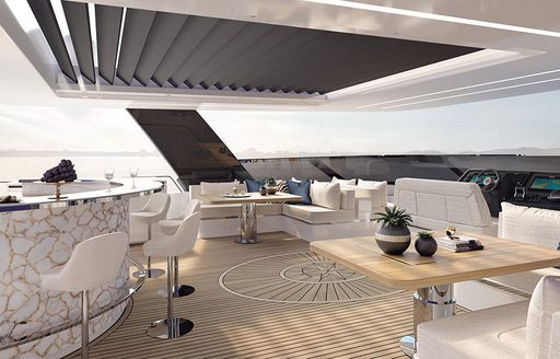 Chairs around flybridge bar area on 80 Sunreef Power Yacht with wooden decking and comfortable seating 