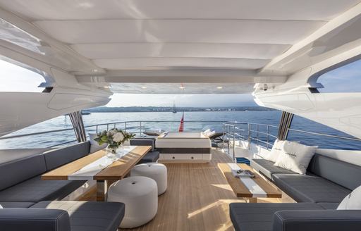 The exterior space on board a Pearl 95 superyacht.