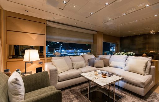 Dimly lit interior of luxury motor yacht