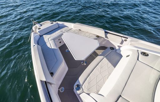 The bow seating onboard the Axopar 29 CCX is finished in a pleated, grey material