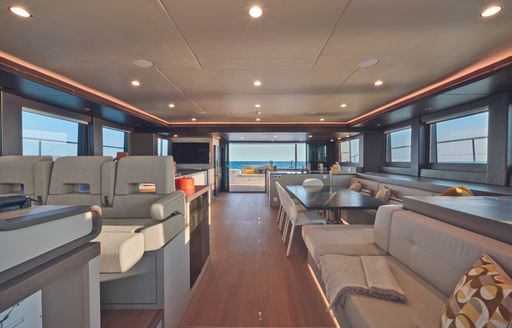 A view towards the stern, looking through the Silent 62 3-Deck Open's salon