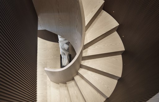 A top down view of the spiral staircase aboard Sanlorenzo superyacht ALMAX