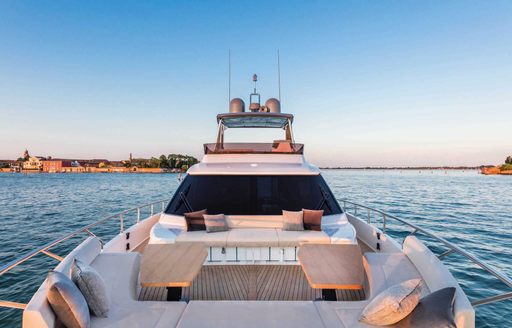 The alfresco dining area on board the Azimut 670 superyacht.