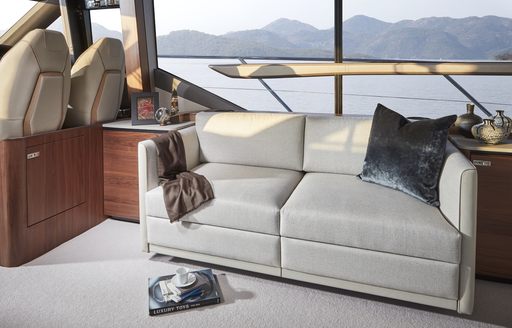 Sofa in front of glass window on Princess F62