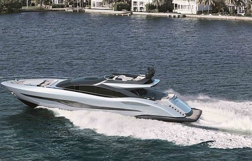 sleek profile of the Mangusta Sport 104 yacht as it cuts through the waters