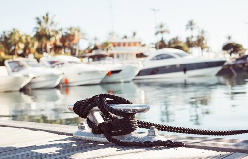 loaded cleat with yachts in background