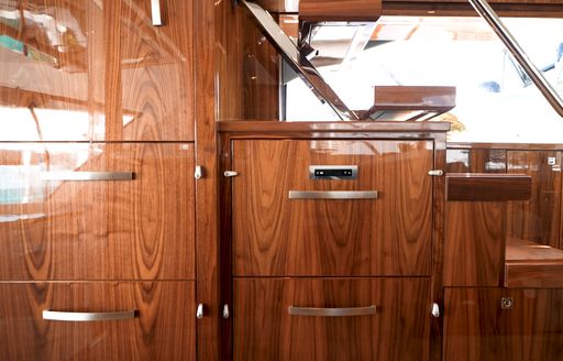 Riviera-58-Sports-Motor-Yacht-storage-under-steps