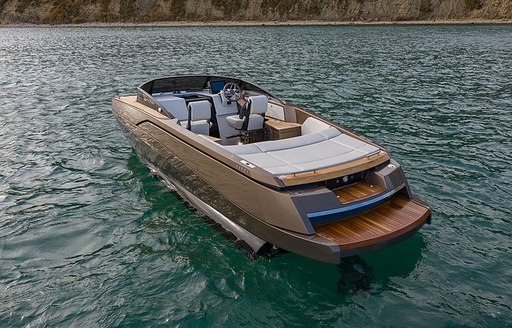 Rear view of Nerea Yachts NY24 at sea, dense foliage in background