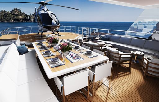 CGI of formal dining area on deck with helicopter in background