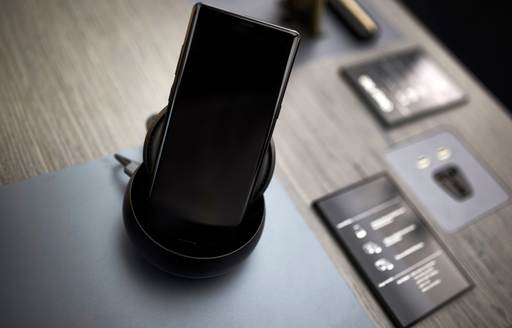 Phone in dock on table