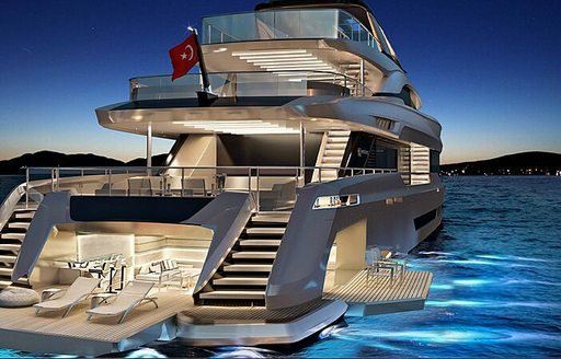 Aft view of Virtus 47m on water at night