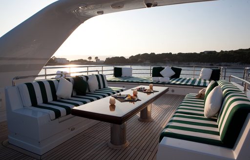 Table and sofas on deck of Dorothea III