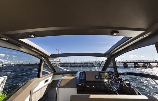 helm on the Galeon 425 HTS sports yacht