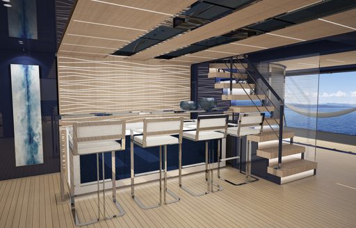 Four bar chairs in front of bar area on ISA Classic superyacht, with wood staircase to right hand side.