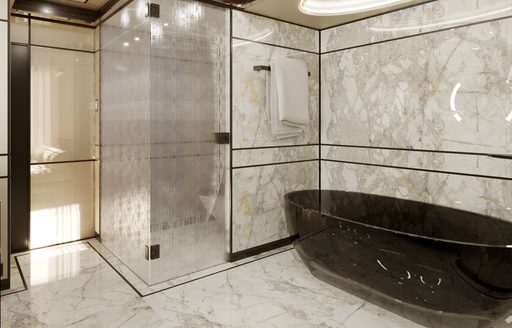 En-suite on Project Gemini with large marble bath tub