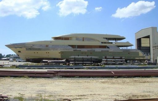 Side view of Trinity T056 hull on tarmac after auction.