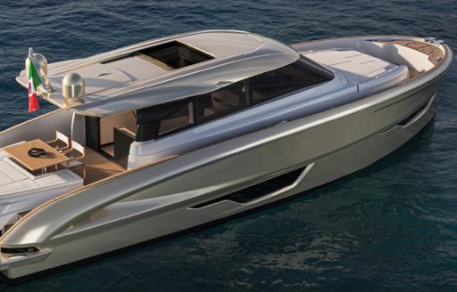 Solaris Power 52 Coupé mid aerial view over starboard quarter deck showing side profile, aft deck with sun pads, Italian flag