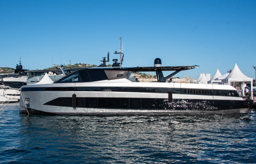 Cannes Yachting Festival 2024 Opening Day wallypower yacht on berth at Vieux Port sunshine blue sky