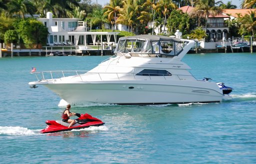 jet ski in water near boat