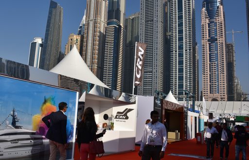 Dubai International Boat Show red walkway, skyscrapers in background