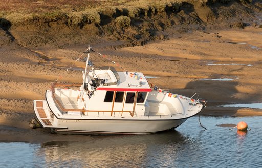 yacht sitting on the sea bed