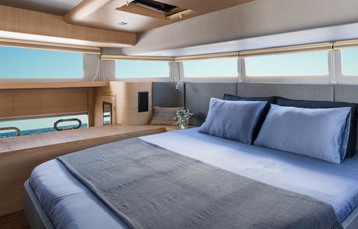 CGI of double bed in cabin on Aquila 54