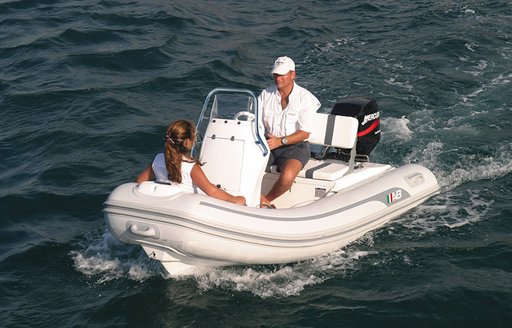 Couple on small RIB tender