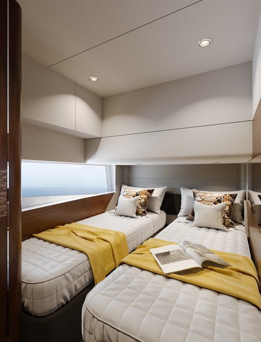 Long view of guest cabin onboard Fairline Squadron 58. Twin berths with wide reaching window.