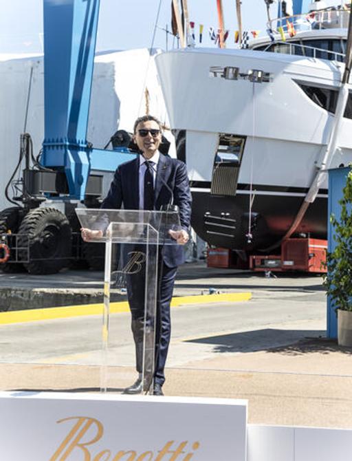 Benetti CEO Marco Valle giving a speech at podium during celebration of the launch in Viareggio