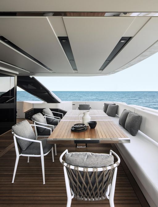 Alfresco set up on the aft deck of Sanlorenzo yacht