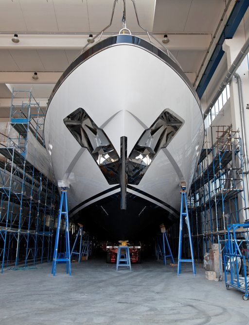 superyacht on stands in workshop