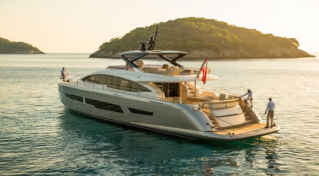 Yacht listed for sale being prepared by crew
