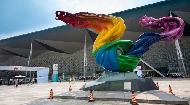 Shanghai World Expo Exhibition and Convention Centre with display in front of it