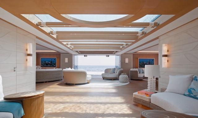 Breakthrough yacht Beach Club Lit Through The Pool