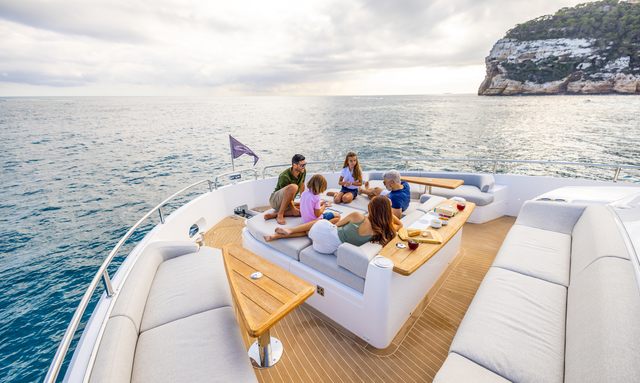 Triple Eight yacht Forward lounge with cinema-ready setup