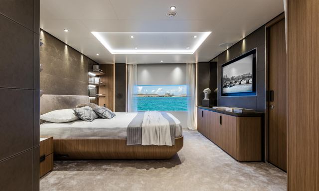 Olivium yacht Full-beam owner suite with detailed finishes