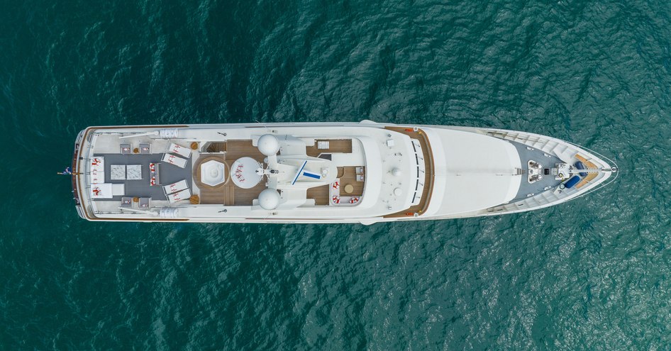 Aerial bird's eye view looking down on superyacht SOLAFIDE, surrounded by sea.