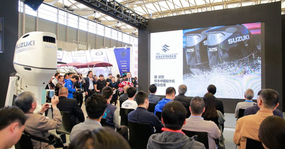 A small talk at the China International Boat Show, group of visitors seated in front of big screen awaiting start of a talk.