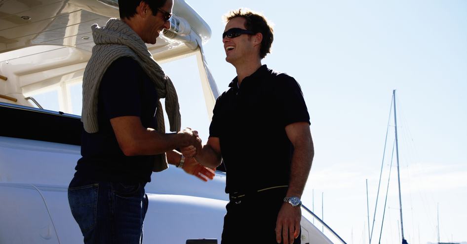 Yacht Owner shaking hands with Yacht Crew