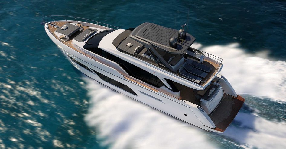 Ferretti yacht moving at speed on water